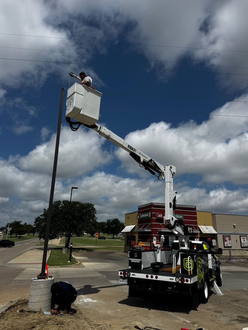 Setting a new parking lot light pole
